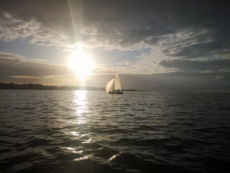 RS200 sailing at sunset